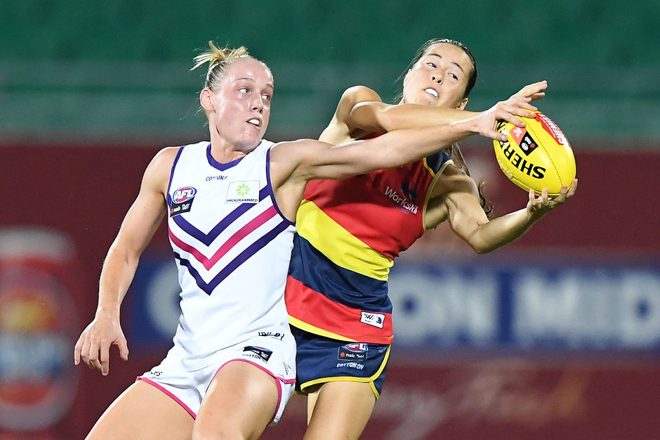 AFLW 2019 Rd 04 - Adelaide v Fremantle DARWIN, AUSTRALIA - FEBRUARY 23: Stephanie Cain of the Dockers and Sophie Li of the Crows compete for a mark during the 2019 NAB AFLW Round 04 match between the Adelaide Crows and the Fremantle Dockers at TIO Stadium on February 23, 2019 in Darwin, Australia. (Photo by Felicity Elliott/AFL Media)